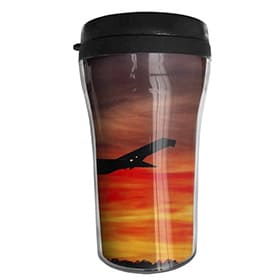 taza portatil de cafe de avion atardecer